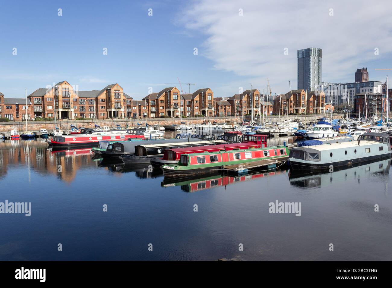 Coburg Dock narrowboats and Mariners Wharf apartments, Liverpool Stock Photo