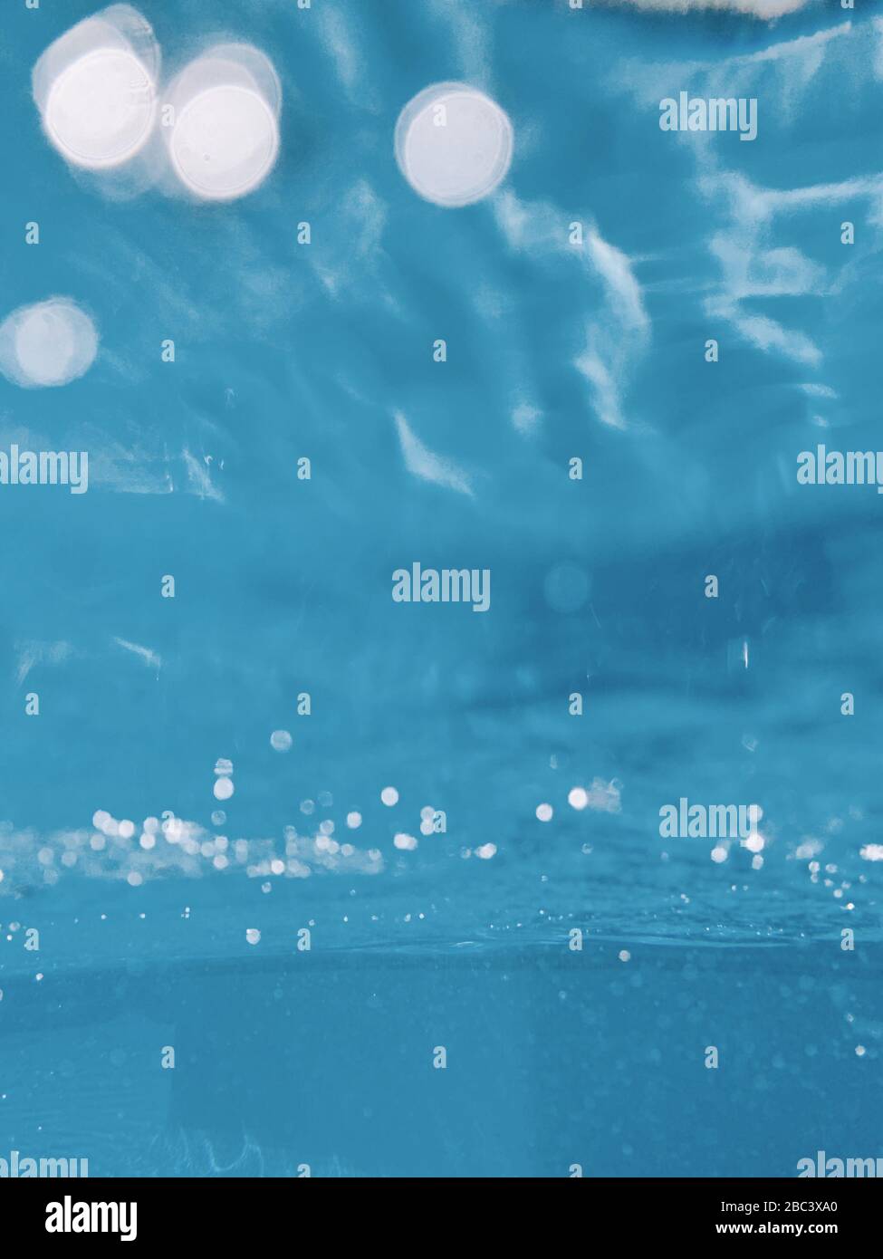 Bubbles in underwater blue image Stock Photo