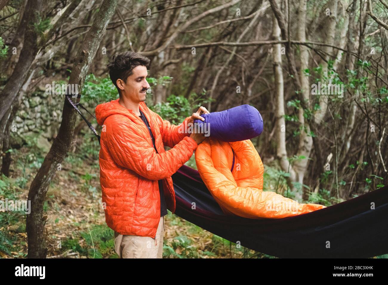 Man sleeping in the forest hi-res stock photography and images - Alamy