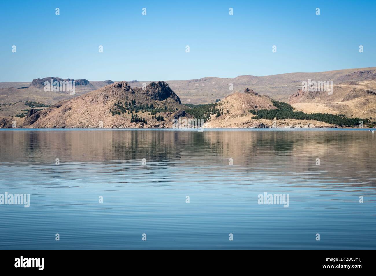 Lake, pines and mountains in the province of NeuquÃ©n, Argentina. Stock Photo