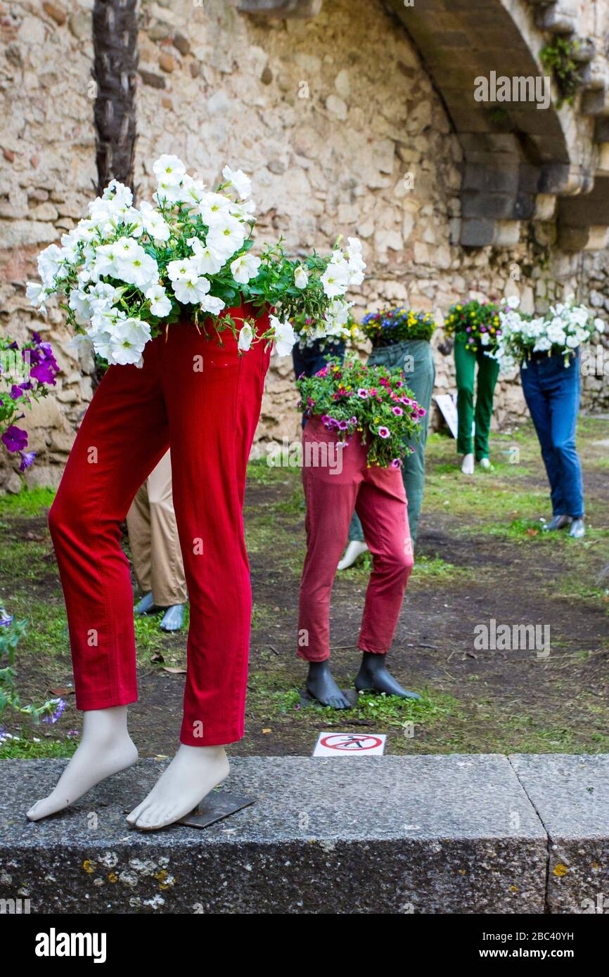 Floristic art bouquets on mannequins at Girona Flower Festival