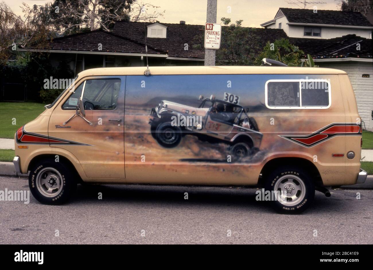 1970s era custom van with painting of a Jeep on the side in Los Angeles, CA Stock Photo