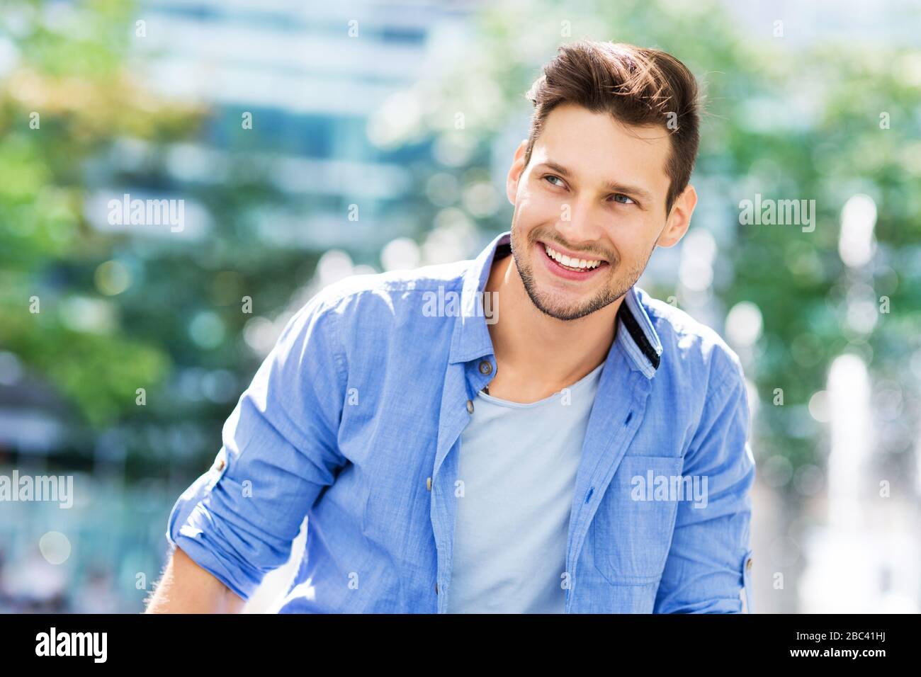 Young man smiling Stock Photo