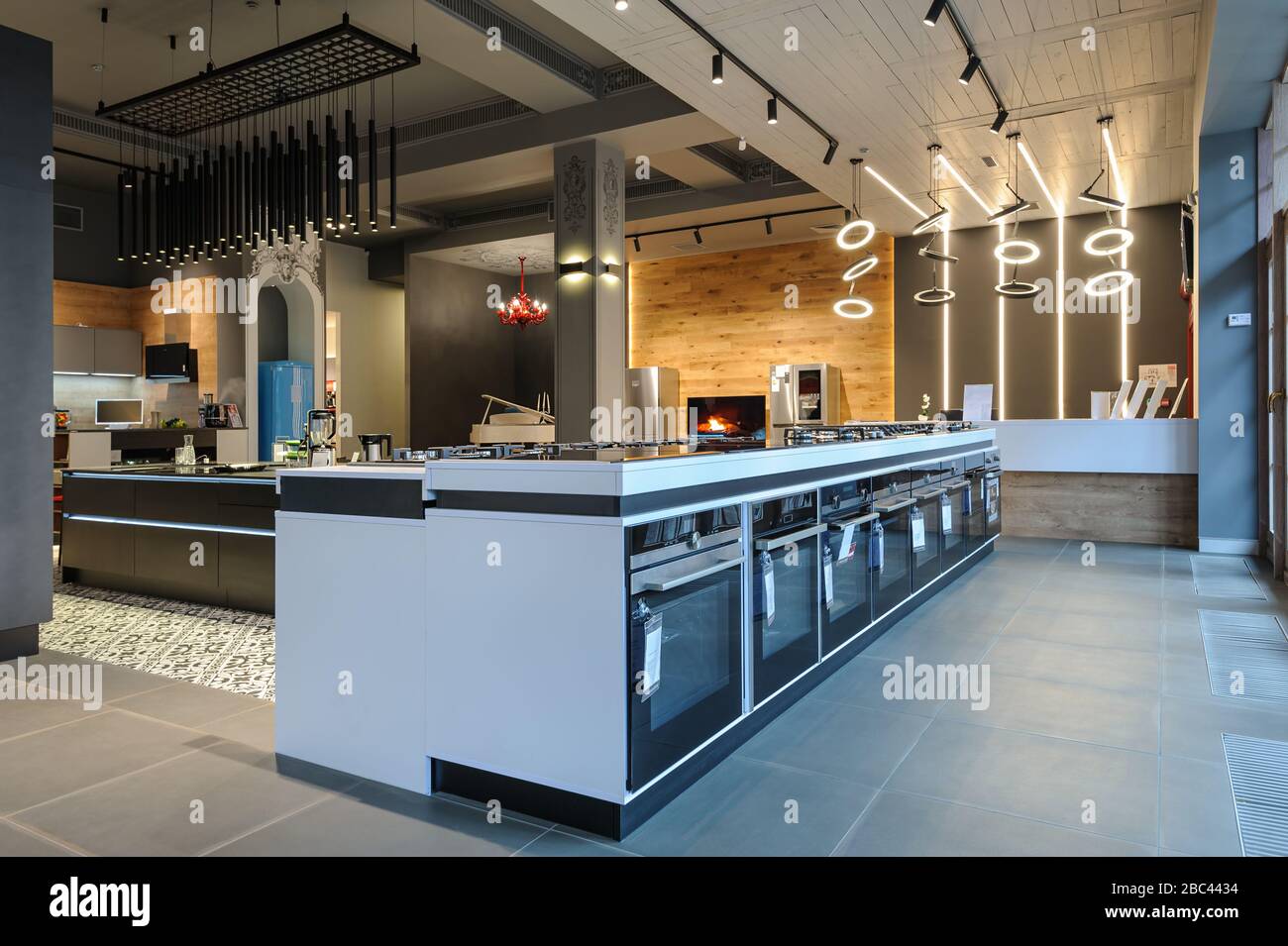 Brand new ovens and gas stoves in apliance store showroom Stock Photo