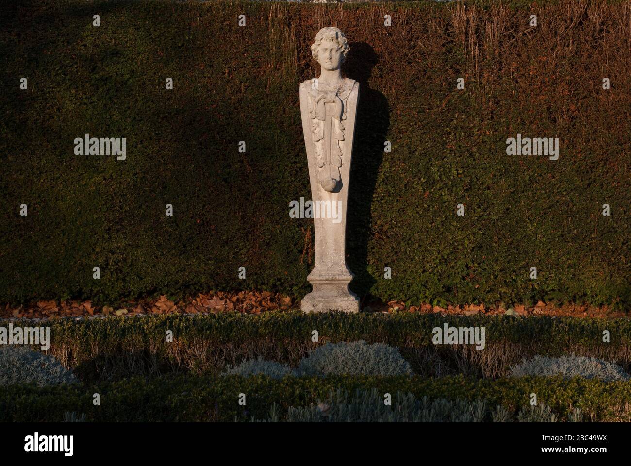 Stone Statues in Formal 17th Century Garden at Kew Palace, Royal