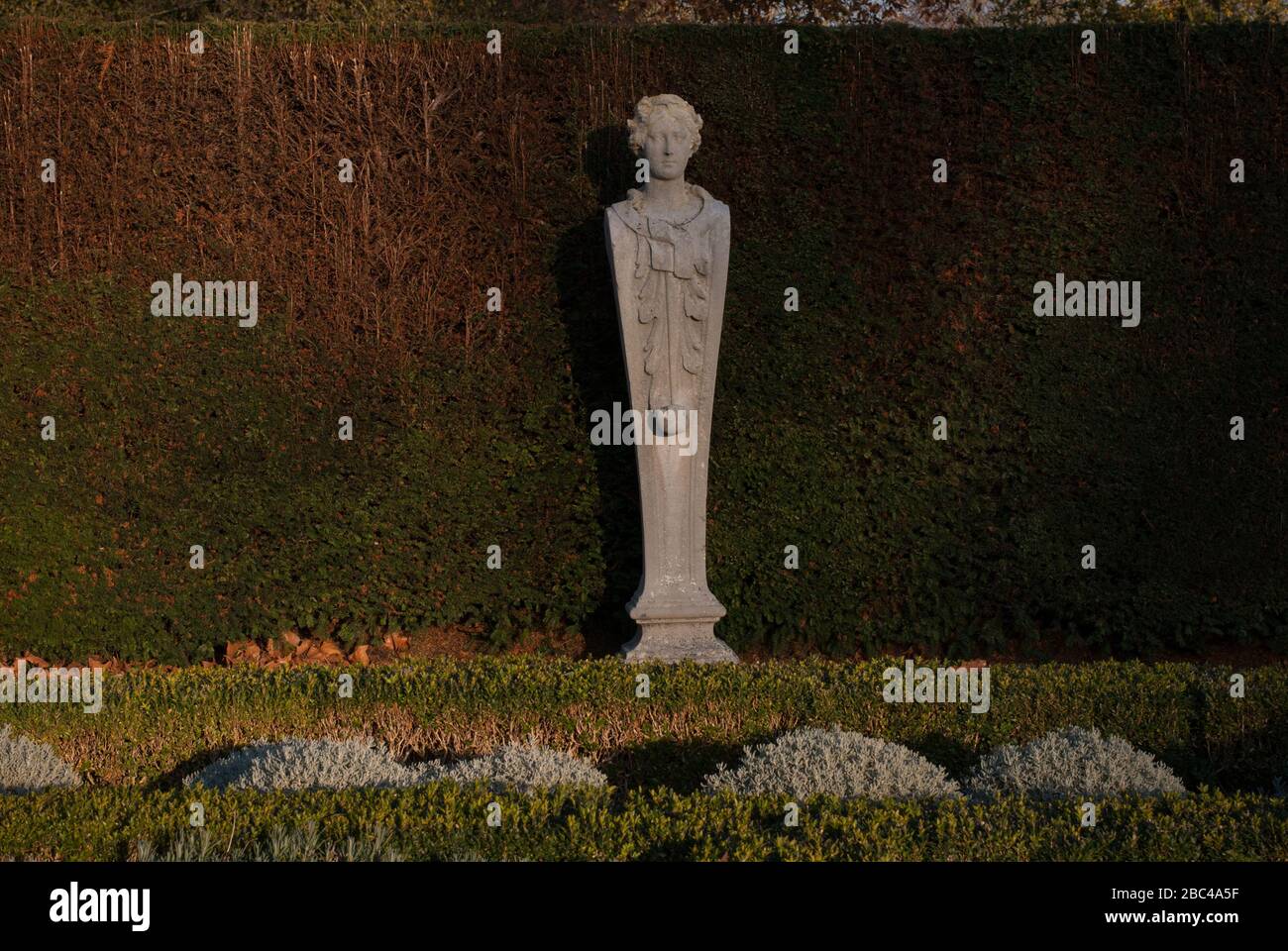 Stone Statues in Formal 17th Century Garden at Kew Palace, Royal
