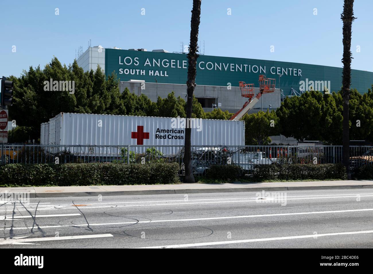 Los Angeles, CA/USA - April 1, 2020: Red Cross trucks lined up at the Los Angeles Convention Center which has become a field hospital for coronavirus Stock Photo