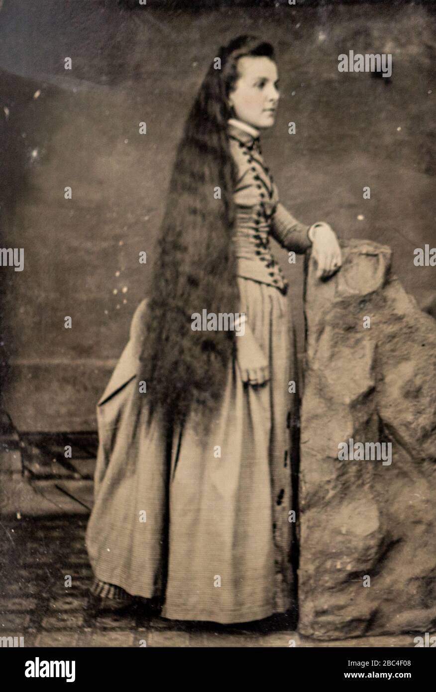 Antique Tintype of a woman with long hair Stock Photo