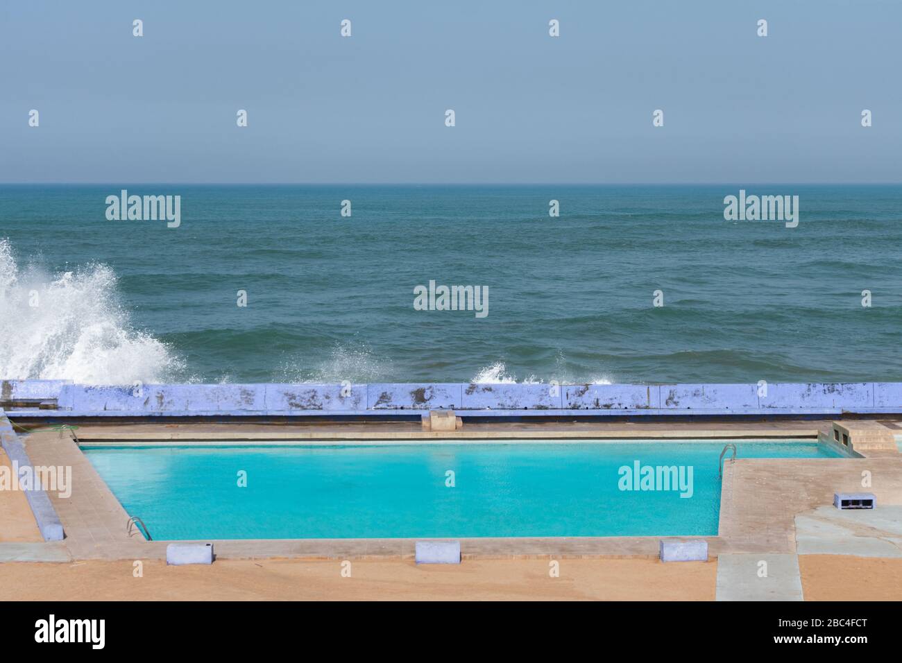 Resort Pool Along The Atlantic Ocean In Casablanca Morocco With Waves