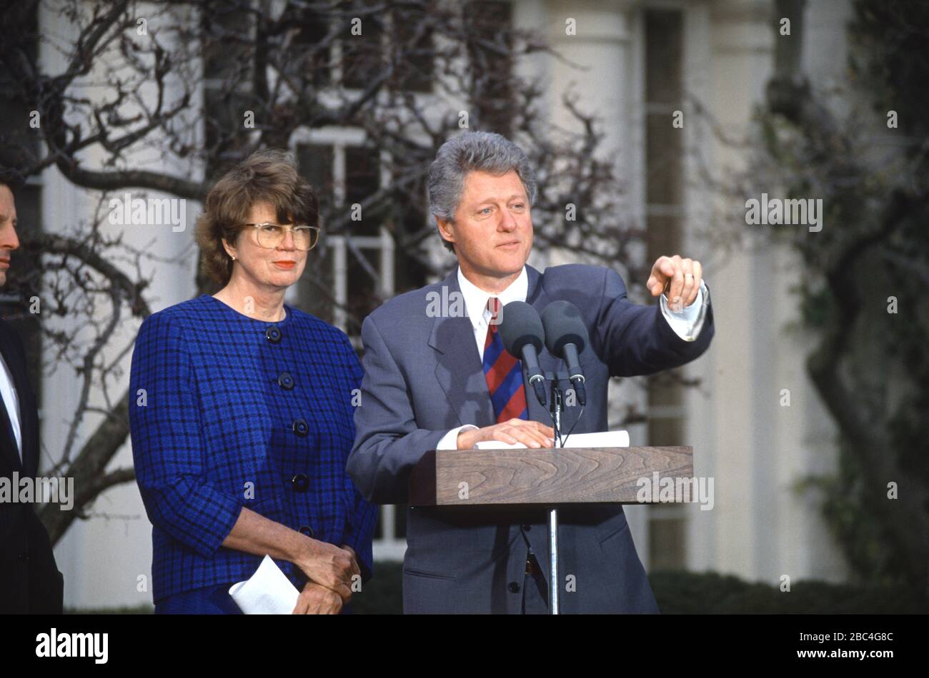 United States President Bill Clinton, right, introduces Janet Reno, State's Attorney for Miami-Dade County, Florida, as his choice to be the US Attorney General in the Rose Garden of the White House in Washington, DC on February 11, 1993. If confirmed, Ms. Reno will become the first woman to serve as US Attorney General.Credit: Howard L. Sachs/CNP | usage worldwide Stock Photo