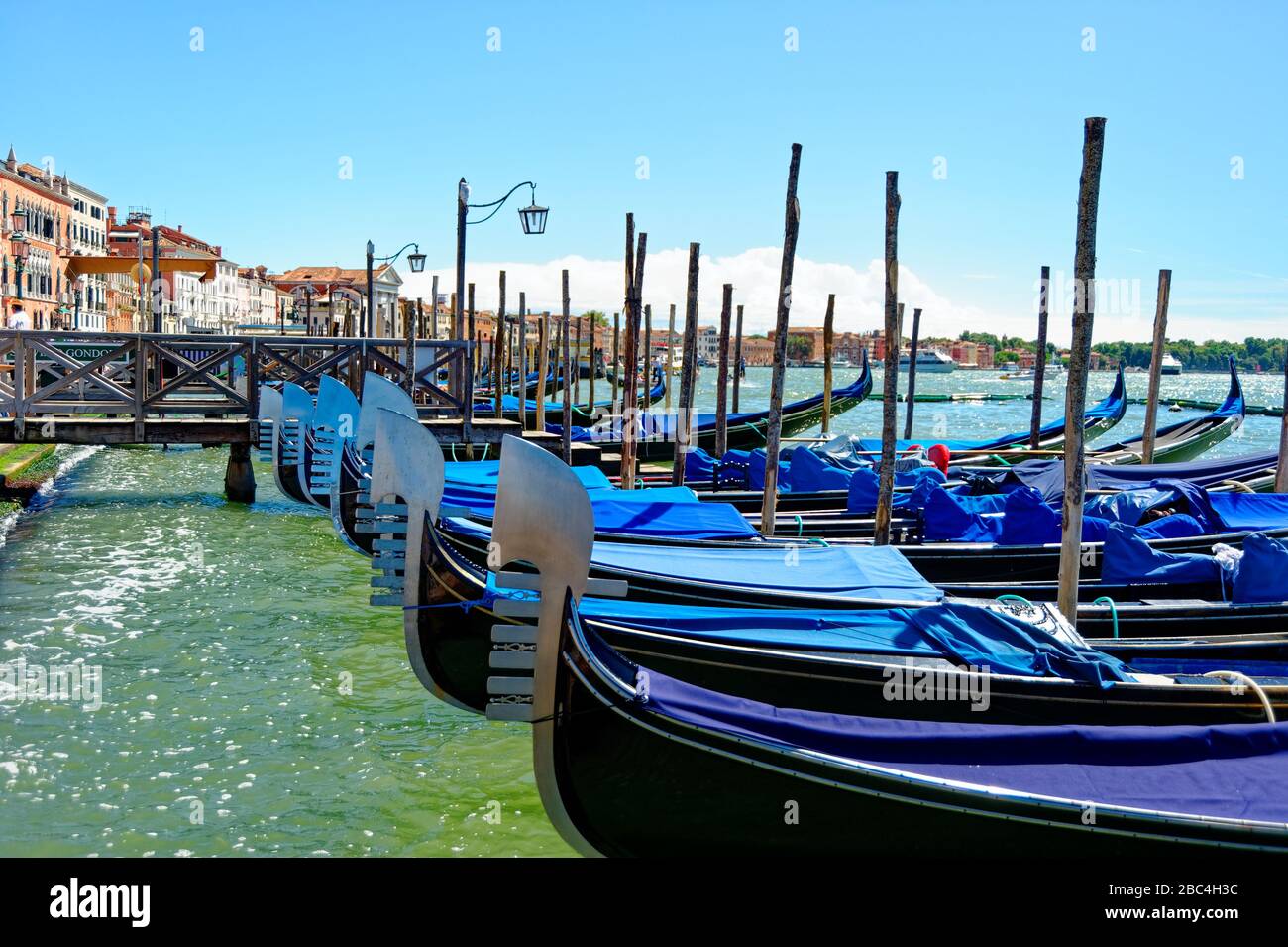 Gondolas moored along Venice Lagoon shoreline Stock Photo - Alamy
