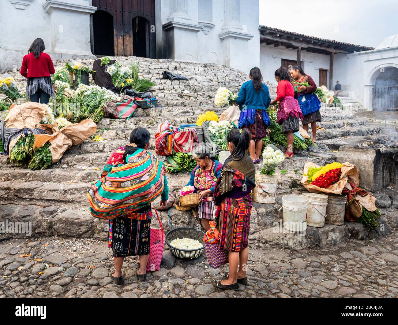 The flower market on the steps of the Iglesia de San Tomas in Chichicastenango, Guatemala. Stock Photo