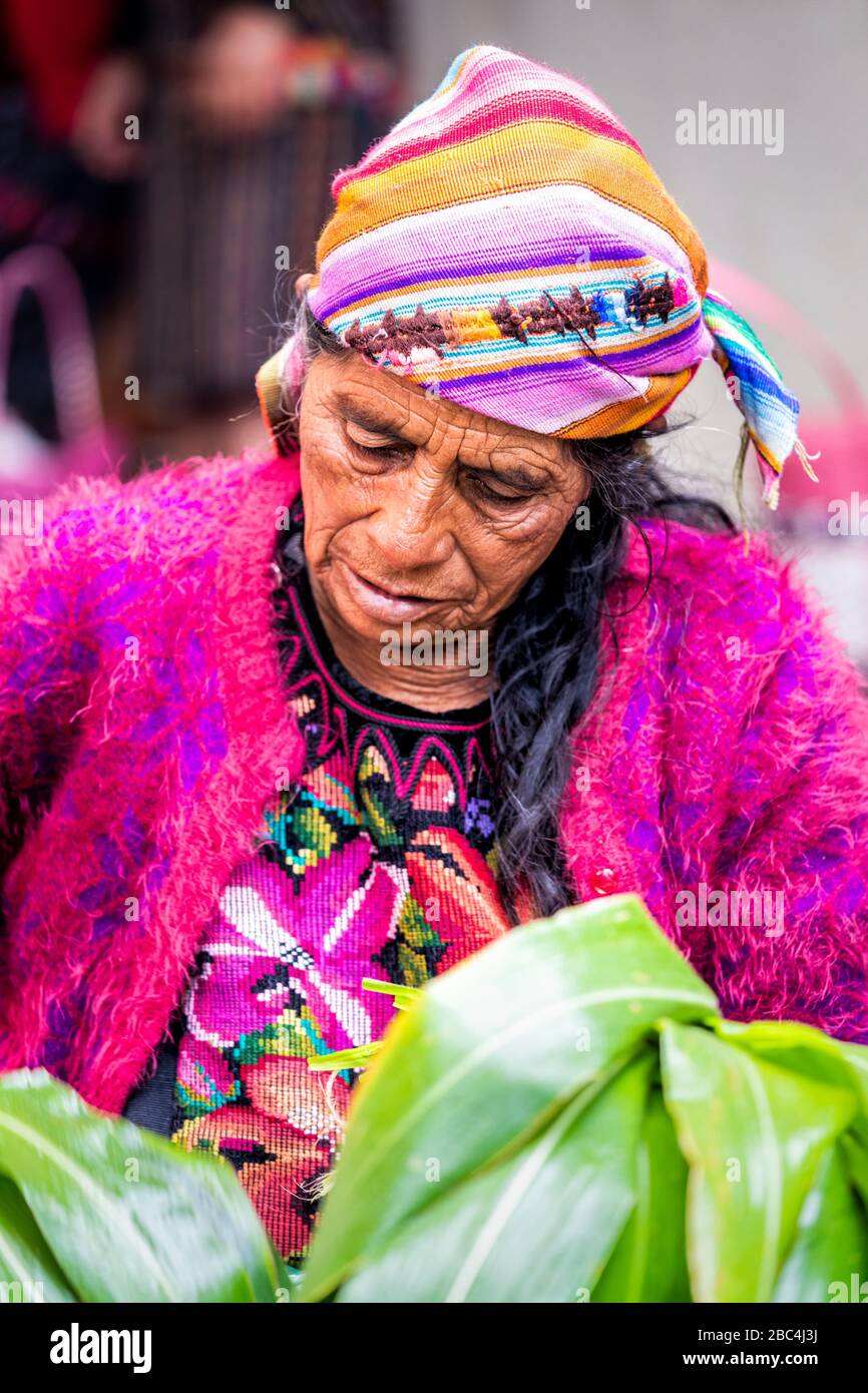 Flower vendor in the market of Chichicastenango, Guatemala. Stock Photo