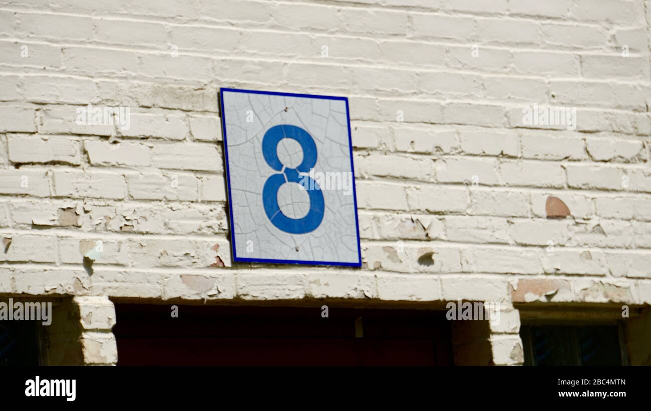 Number eight sign, Ward eight, Ward 8, Door 8 at historic Kirkbride mental asylum building, also called the Fergus Falls State Hospital, now closed. Stock Photo