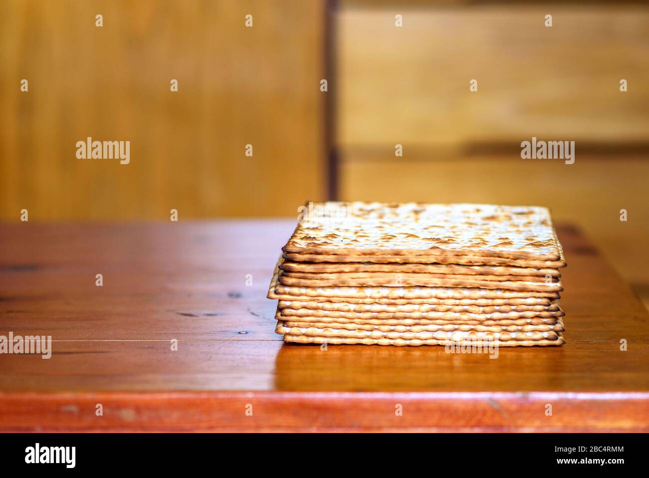 Pile of jewish Passover matzah unleavened bread. Symbols of Passover