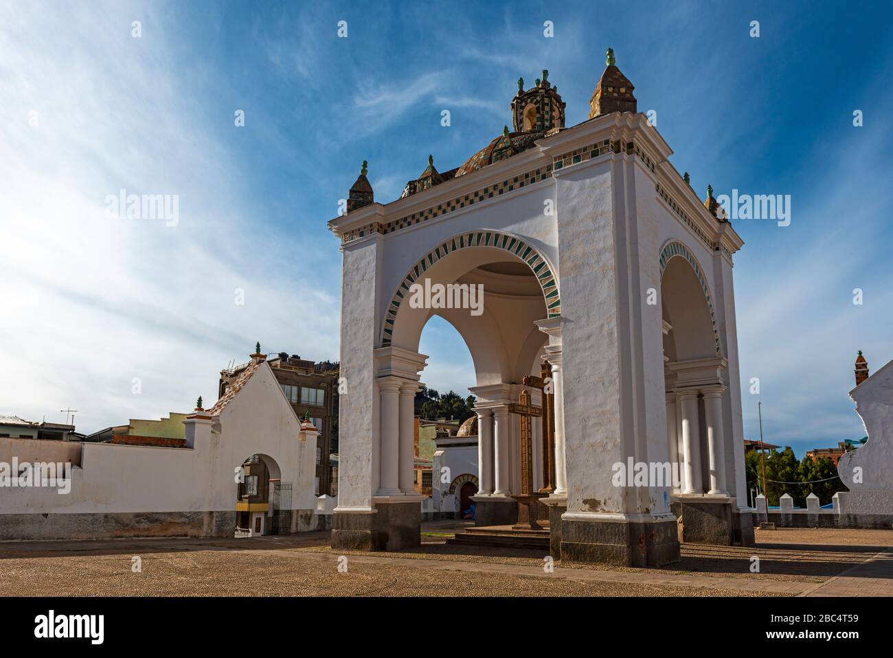 Arch construction on the square in front of the Basilica of Our Lady of Copacabana at sunset, Copacabana city, Bolivia. Stock Photo