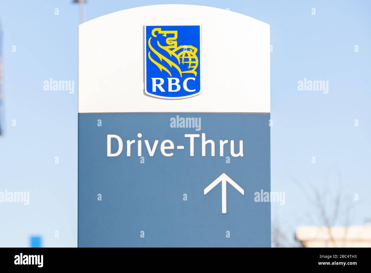 Sign showing Royal Bank of Canada (RBC) drive thru to the ATM. Self serve banking. Stock Photo