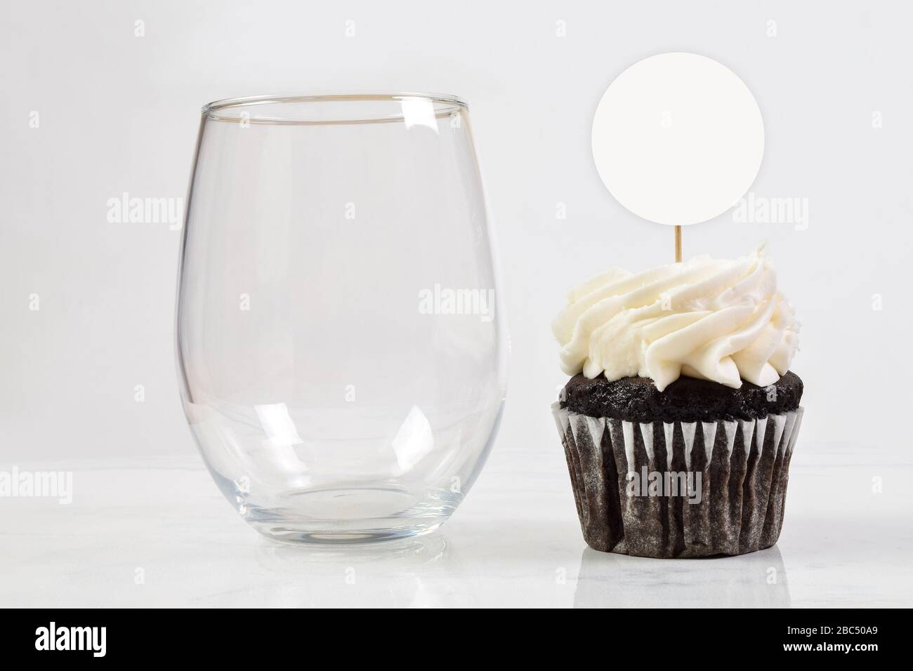 This cupcake topper and no stem wine glass mock up features an elegant