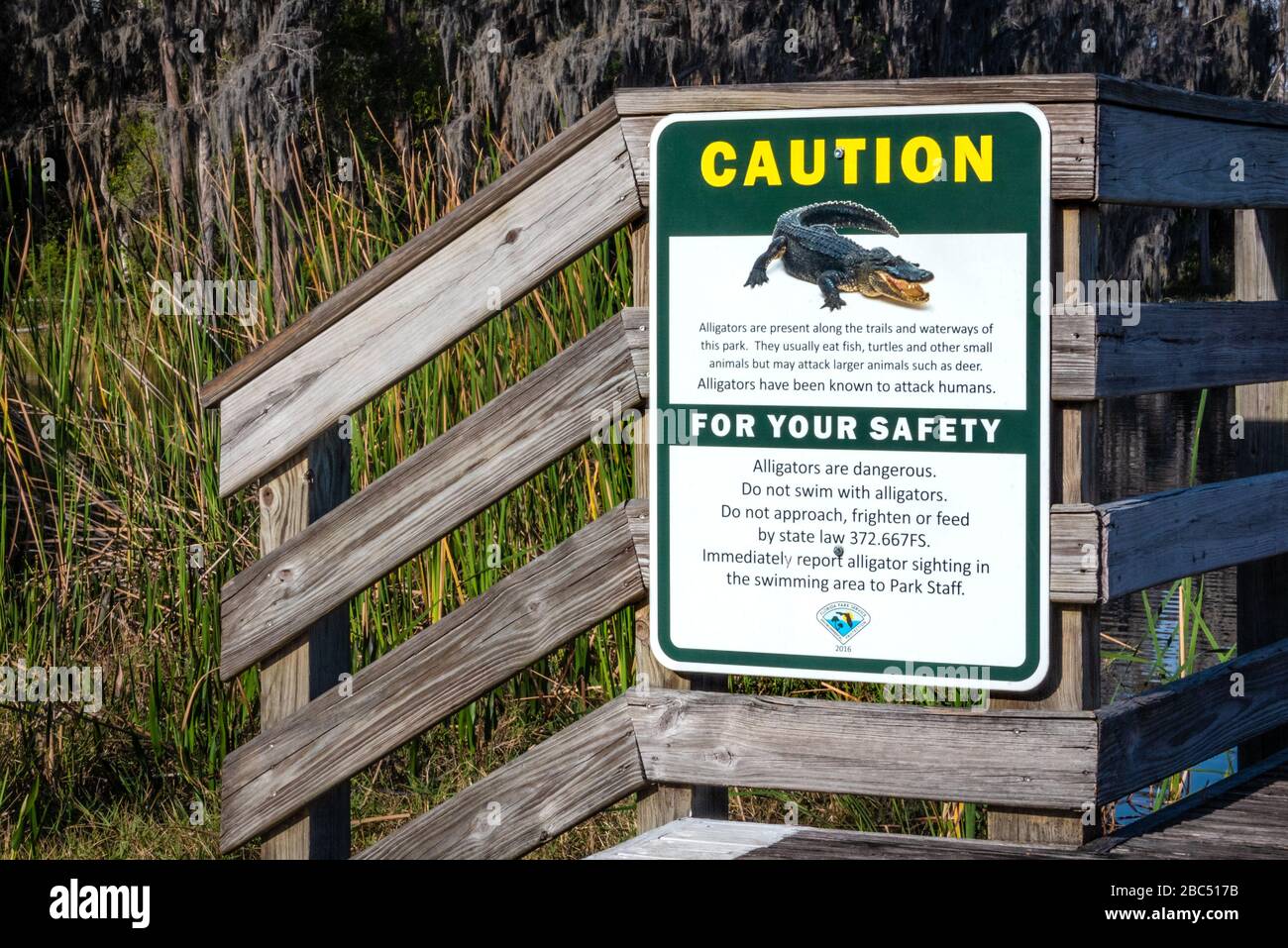 Alligator warning sign at Lake Louisa State Park in Clermont, Florida. (USA) Stock Photo