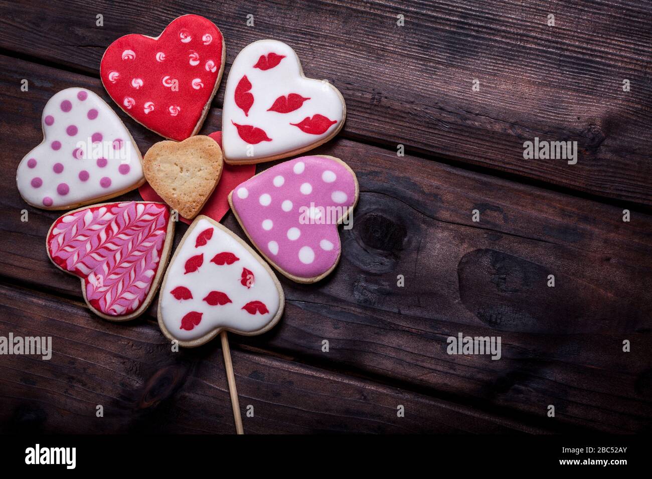 Close-Up Of Heart Shape Cookies On Wooden Table background Stock Photo