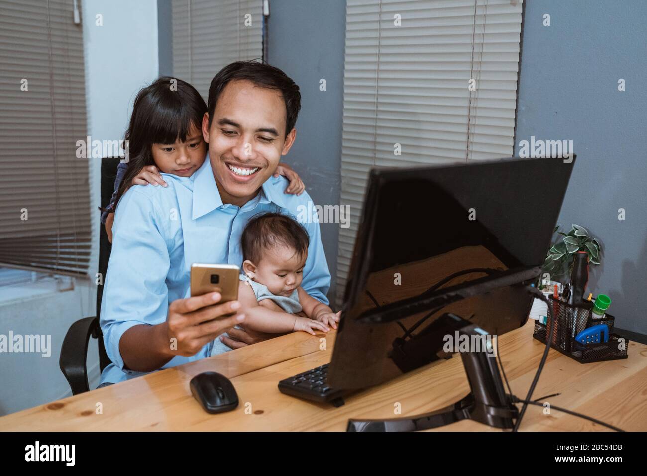 work from home. father or businessman working while stay home Stock Photo