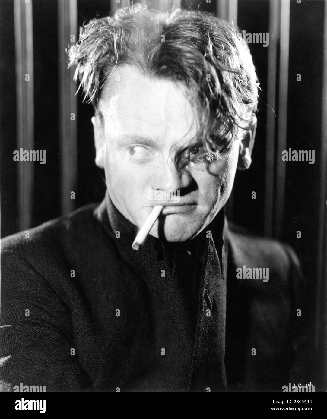 JAMES CAGNEY Portrait as Tom Powers in THE PUBLIC ENEMY / ENEMIES OF THE PUBLIC (UK original release title) 1931 director WILLIAM A. WELLMAN novel KUBEC GLASMON and JOHN BRIGHT Warner Bros. Stock Photo