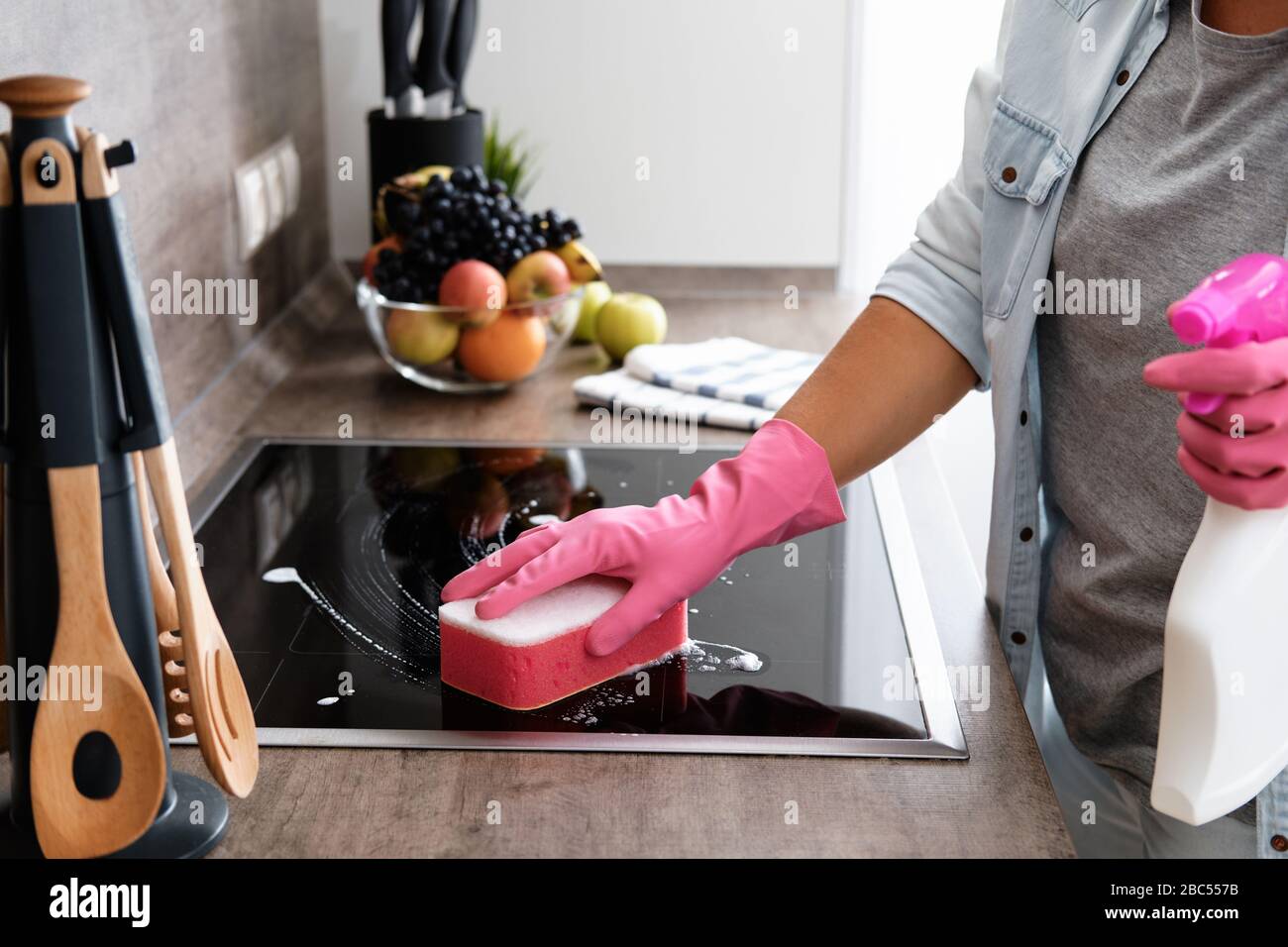 Cleaning Induction Hob. Cleaning service concept Stock Photo Alamy