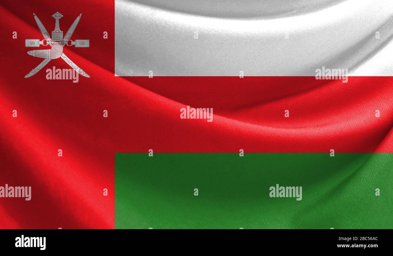 Realistic flag of Oman on the wavy surface of fabric Stock Photo - Alamy