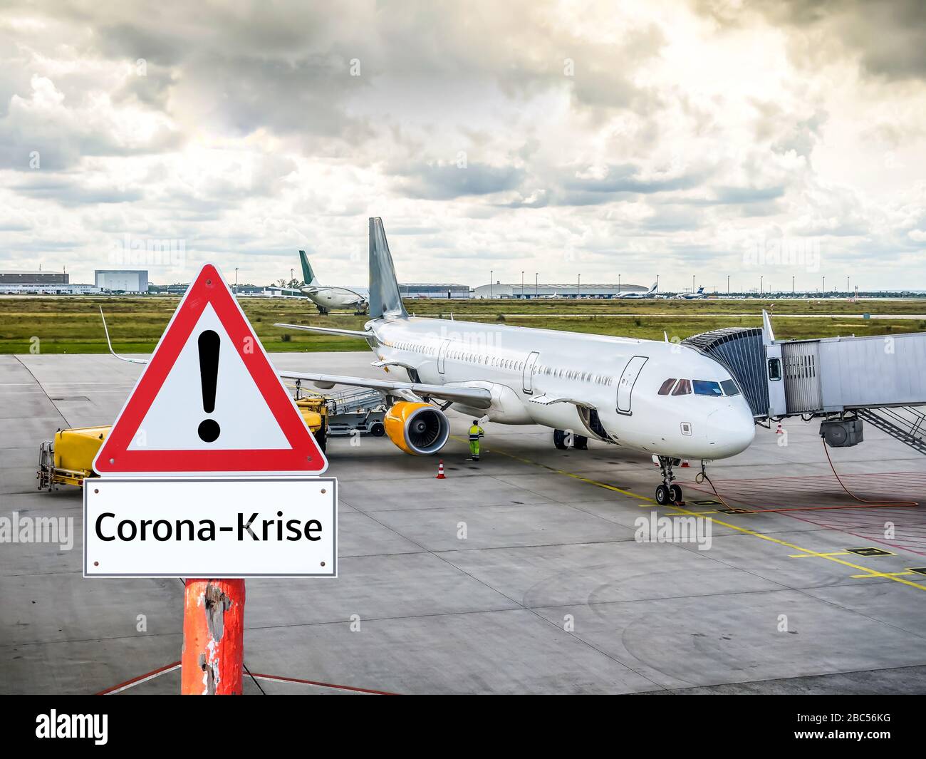 Corona crisis aviation warning sign in german Stock Photo