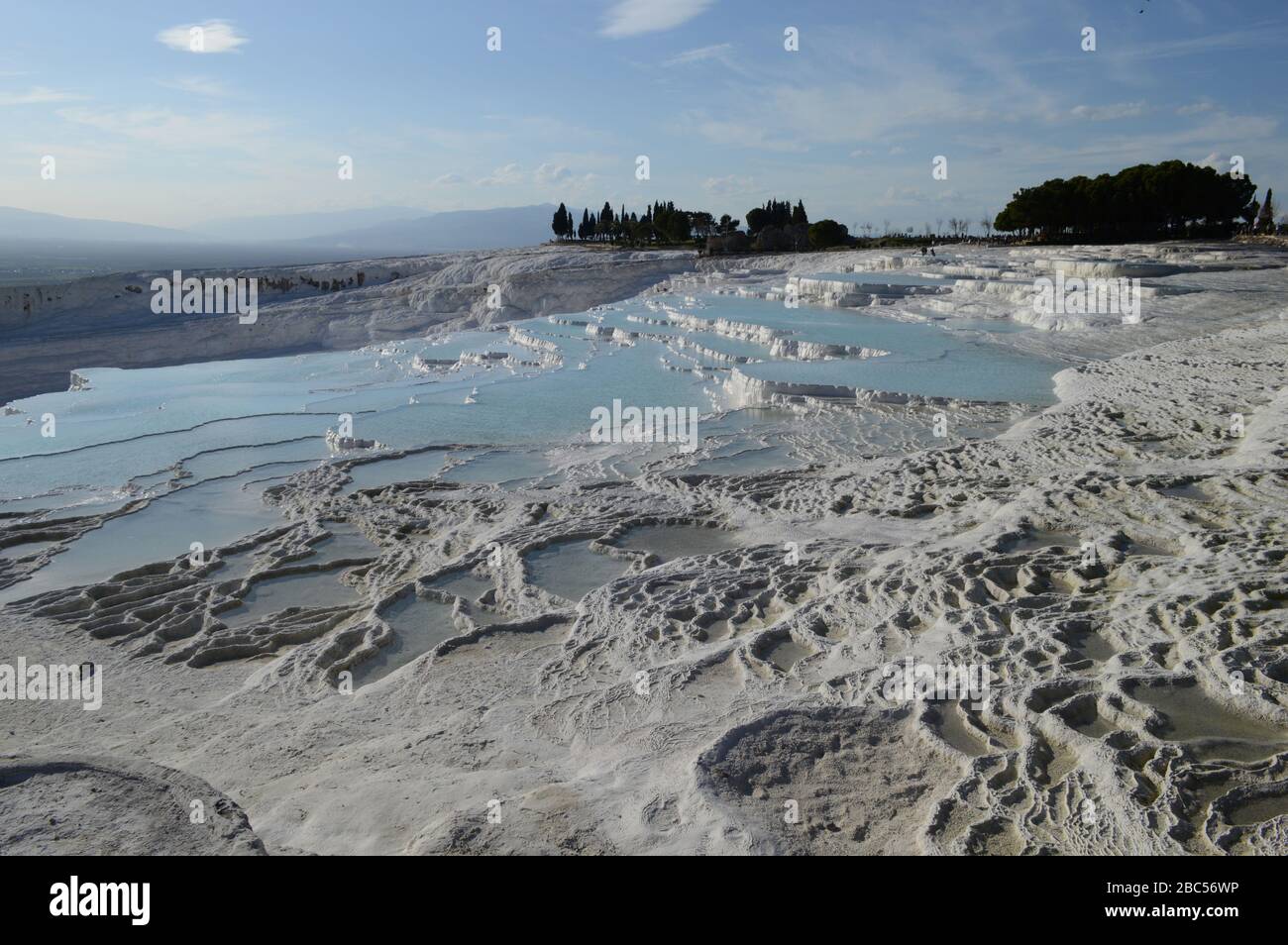 Lime residue from the Thermal Springs that forms a white landscape. Pamukkale Hierapolis. Stock Photo