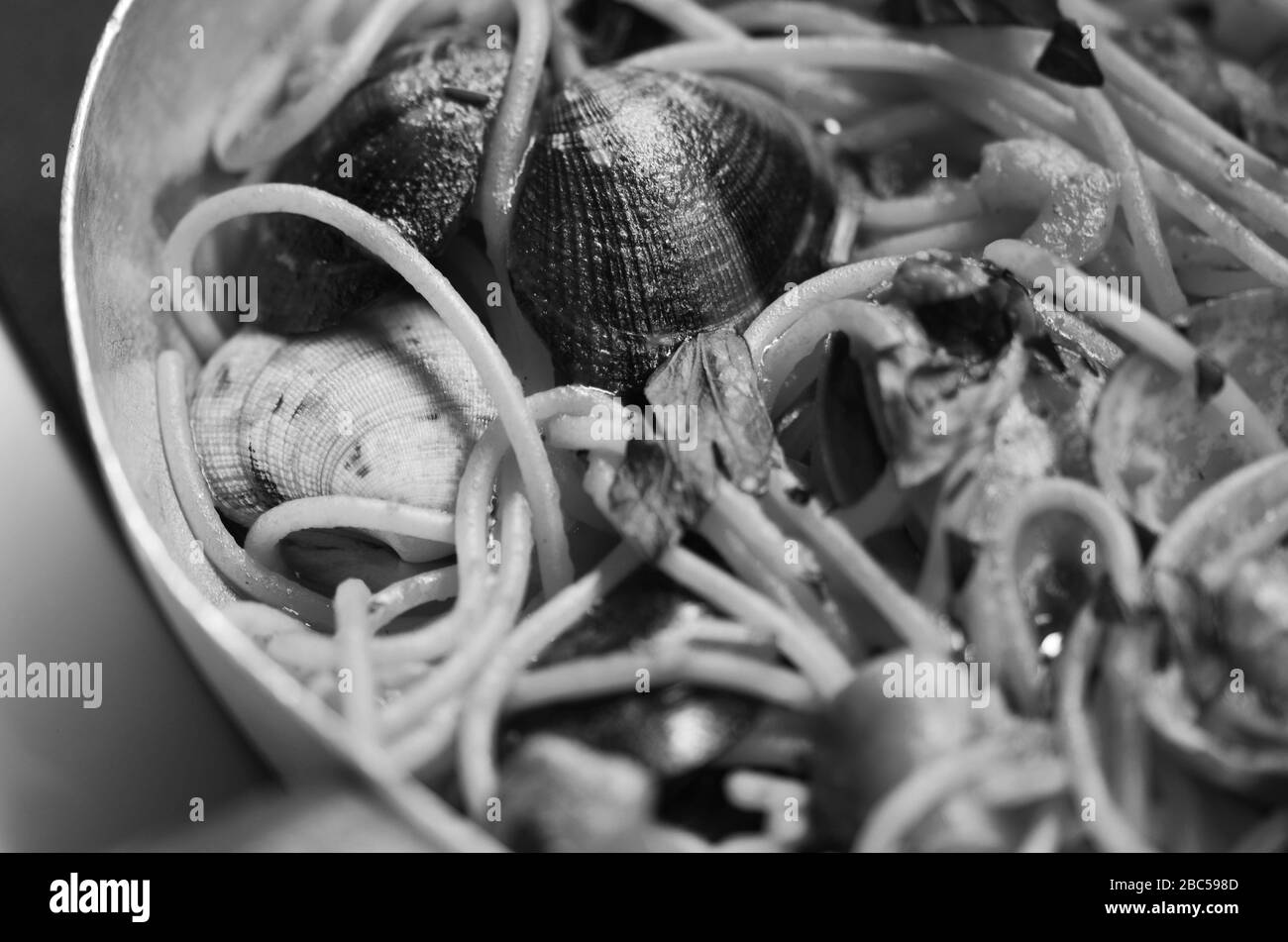 Fish and herb pasta Black and White Stock Photos & Images Alamy