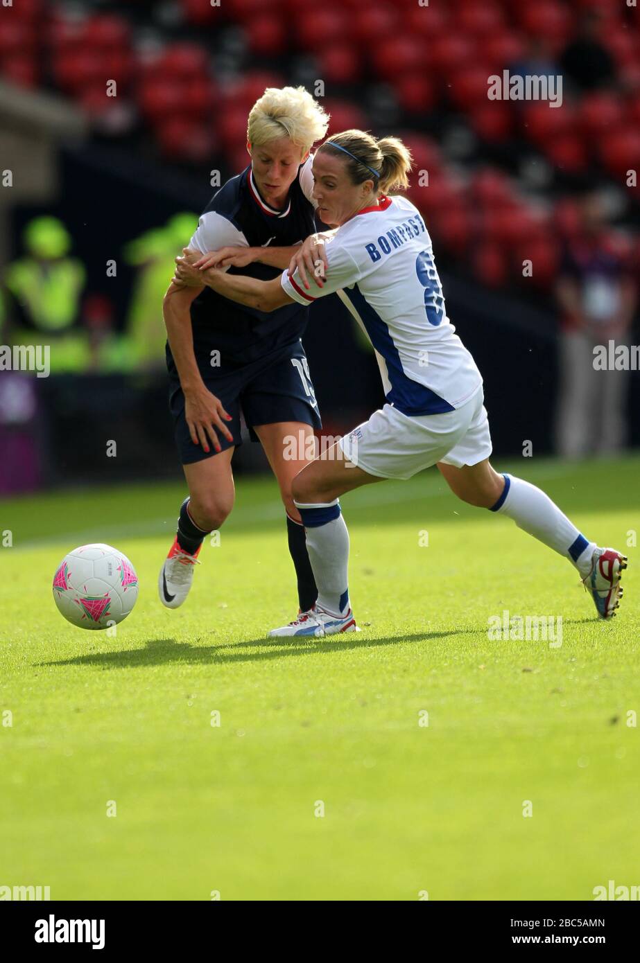 Usa S Megan Rapinoe Left And France S Sonia Bompastor During The Women S Football First Round Group G Match At Hampden Park Glasgow Stock Photo Alamy