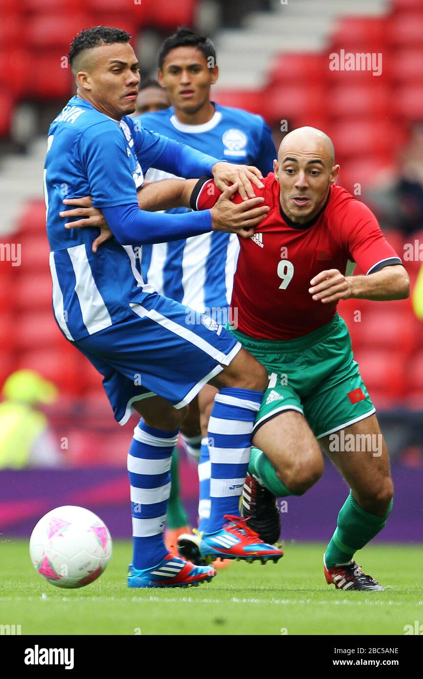 Honduras' Arnold Peralta and Morocco's Noureddine Amrabat during the Honduras v Morocco Group D match at Hampden Park Stock Photo