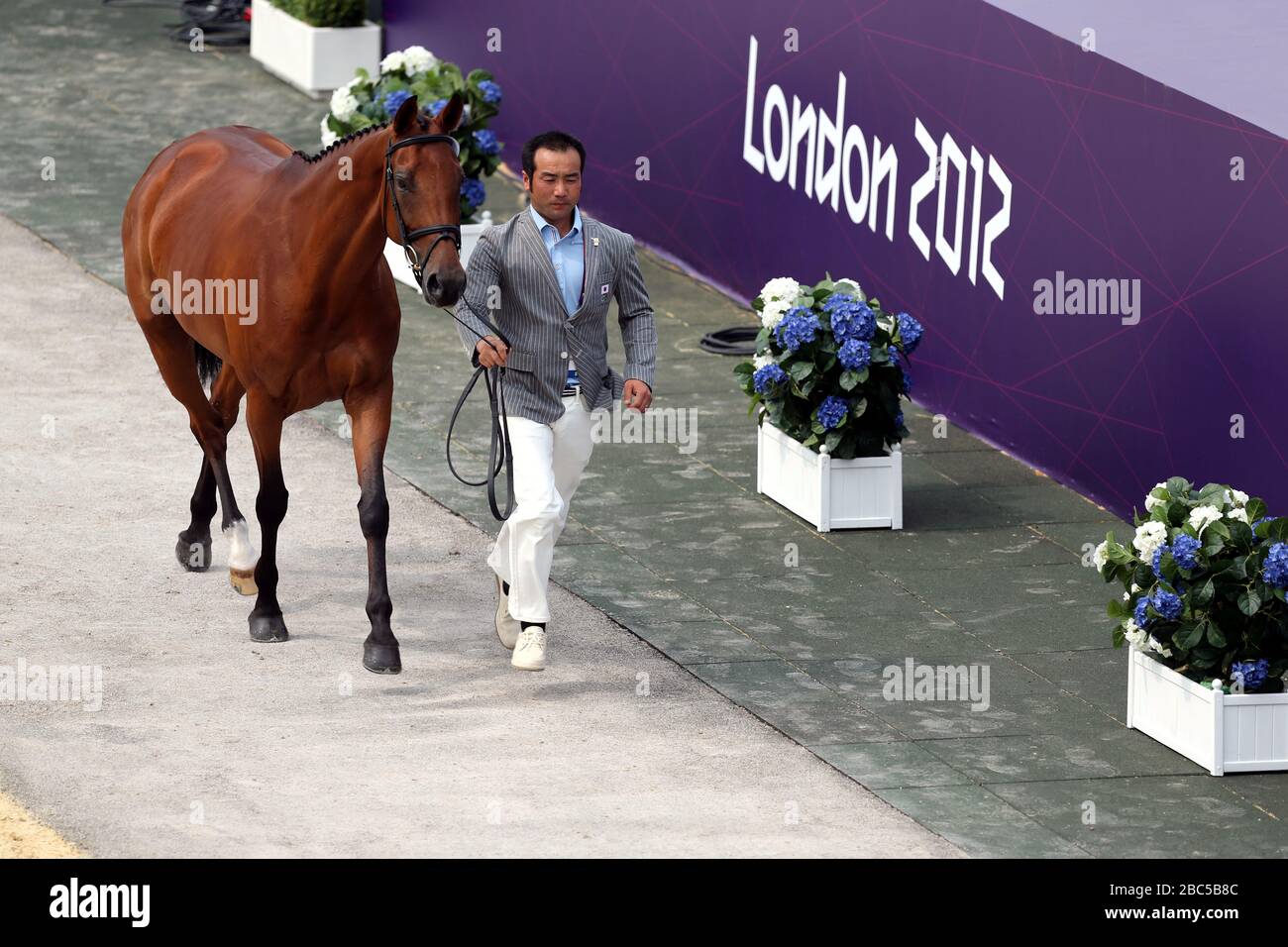 Japan's Atsuhi Negishi with his horse Pretty Darling takes part in the first Eventing Olympic Horse Inspection at Greenwich Park, London. Stock Photo