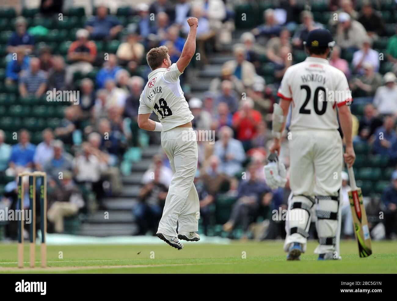 Stuart Meaker Surrey's Stuart Meaker (left) celebrates after taking the wicket of ...