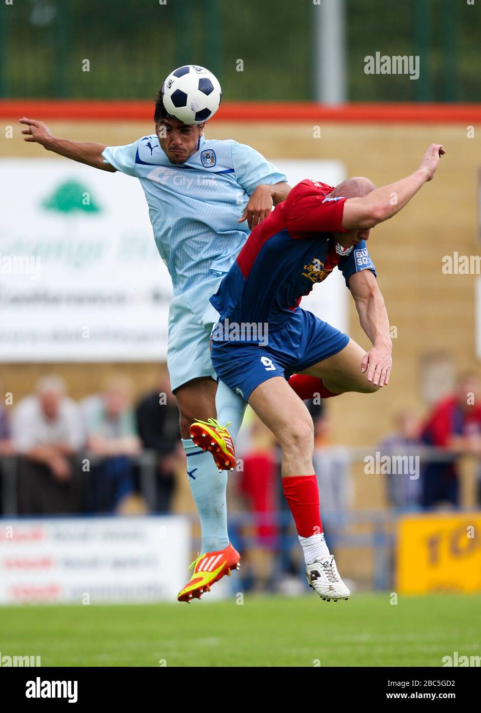 Hinckley United's Jason Bradley battles for possession of the ball with Coventry City's Kevin Malaga Stock Photo