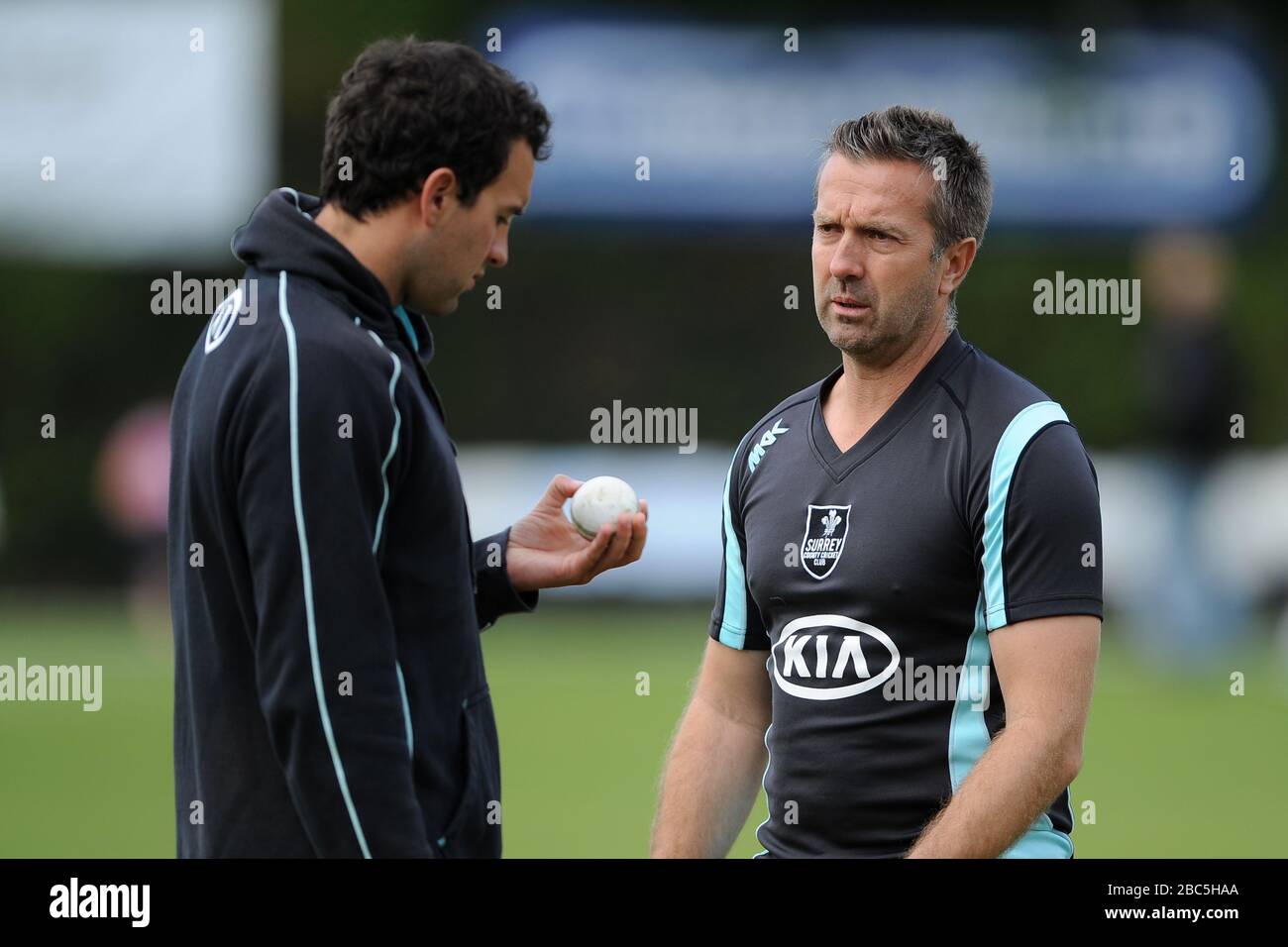 Surrey Lions coach Ian Salisbury (right) chats with Matthew Spriegel Stock Photo