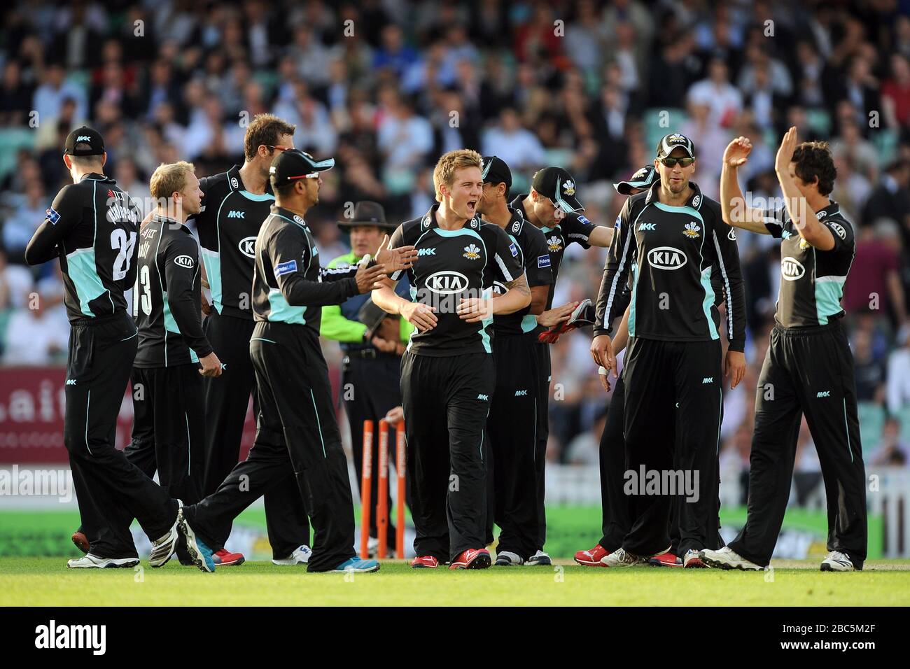 Surrey Lions players celebrate the wicket of Kent Spitfires' Azhar Mahmood Stock Photo