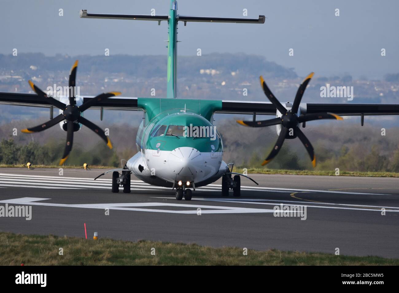 An Aer Lingus airline propeller plane on the runway at Bristol