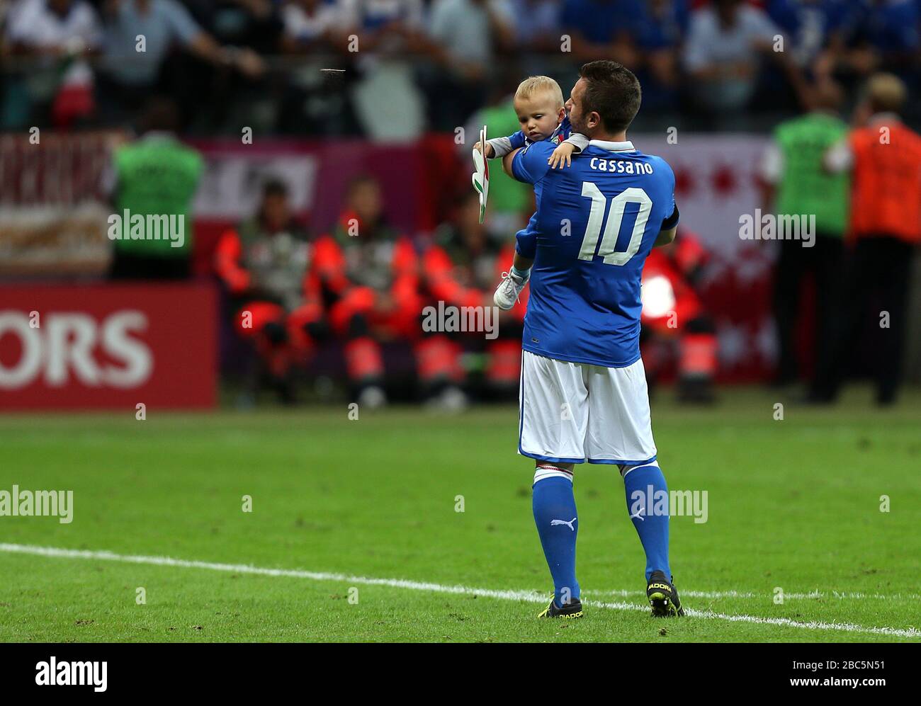 Italy's Antonio Cassano celebrates with his son Christopher on the pitch after the final whistle Stock Photo