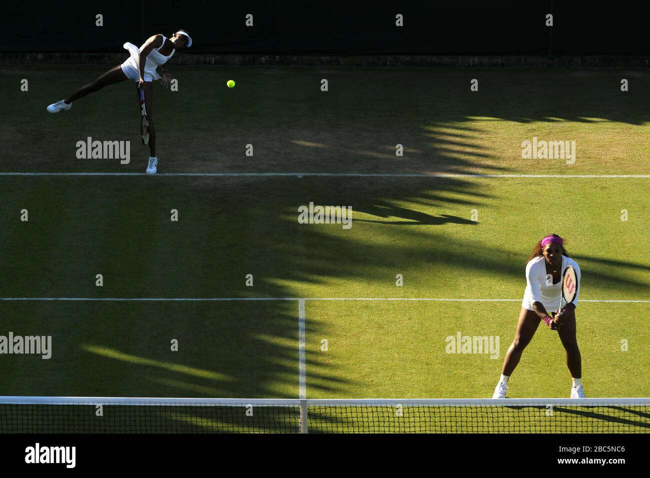 USA's Serena and Venus Williams (left) in action in their doubles game against Serbia's Vesna Dolonc and Ukraine's Olga Savchuk Stock Photo