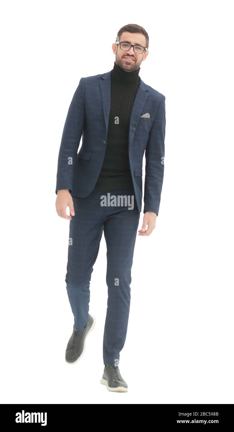in full growth. confident business man taking a step forward Stock ...