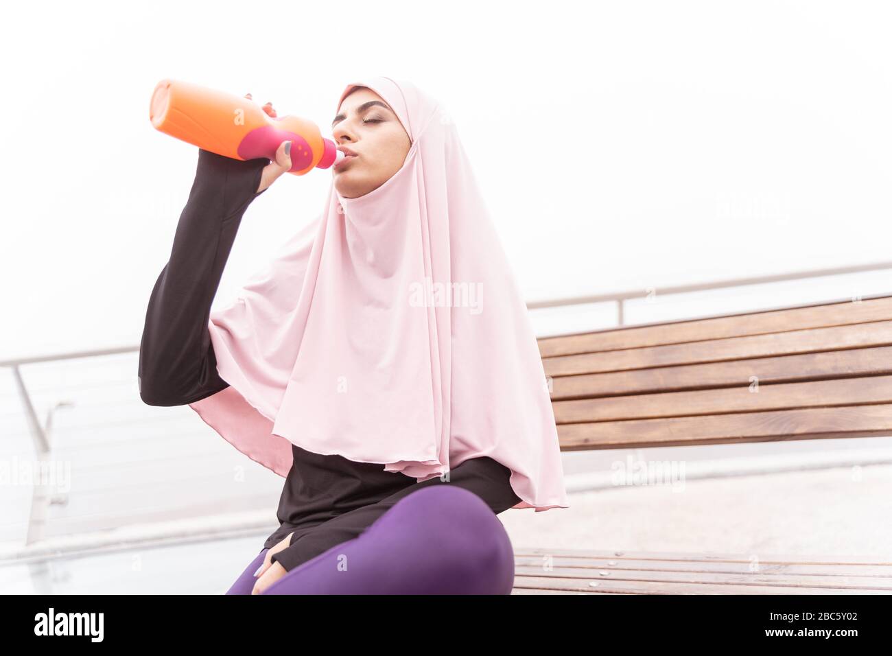 Hijab drinking hi-res stock photography and images - Alamy