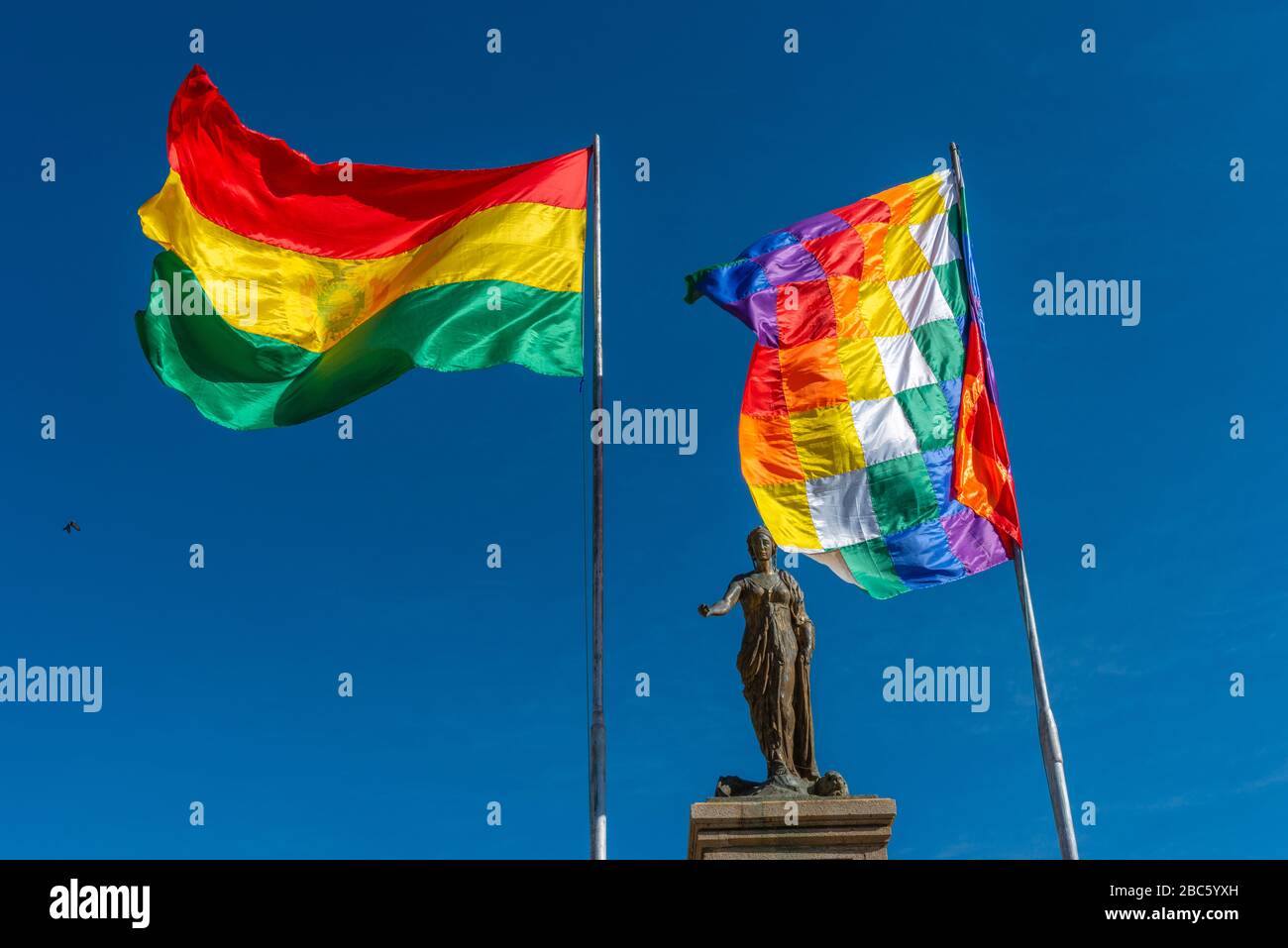 Bolivian flag and flag of the indigenous people,Copacabana, Lake Titicaca, Andes Mountains, Department La Paz, Bolivia, Latin America Stock Photo