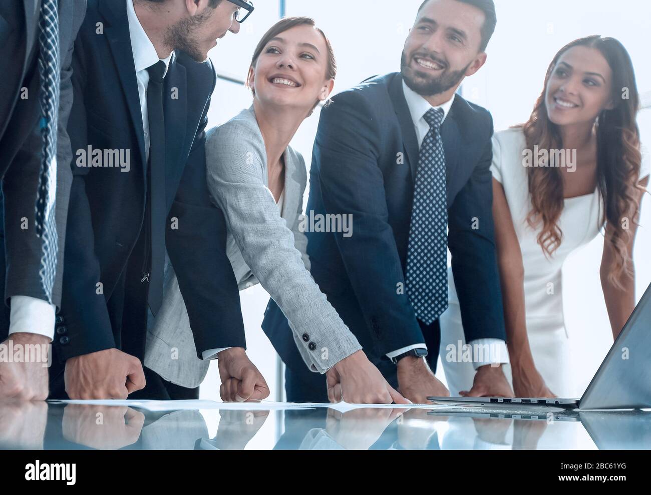 business team standing near the office Desk Stock Photo - Alamy