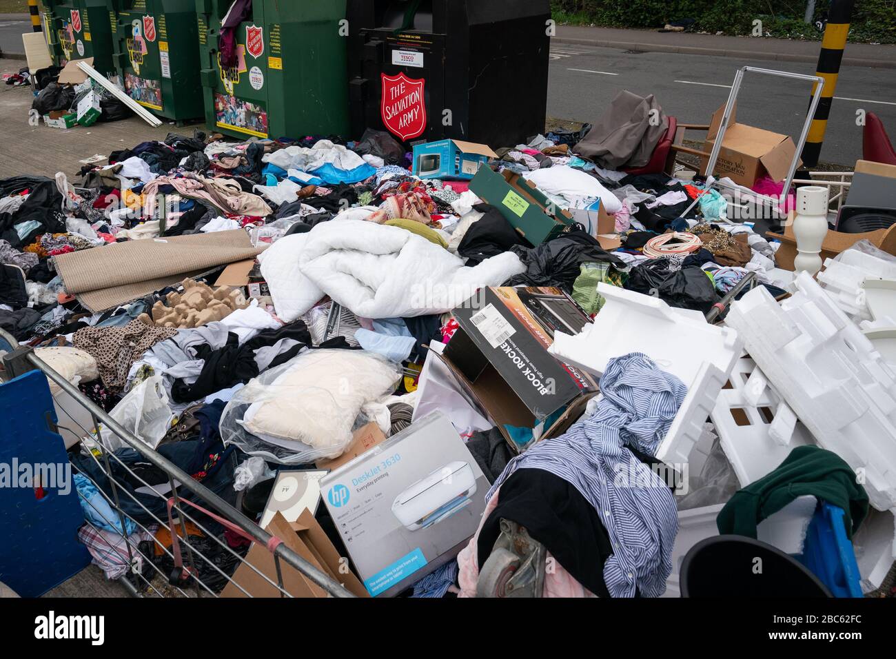 Rubbish stacked high by a reCycling point at Tesco Extra in Wembley as the UK continues in lockdown to help curb the spread of the coronavirus. Stock Photo