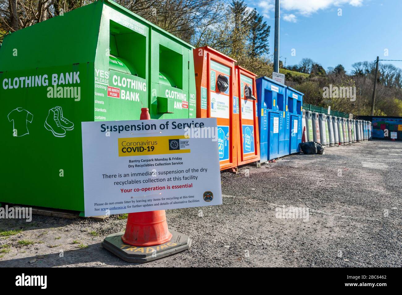 Bantry, West Cork, Ireland. 3rd Apr, 2020. The Bantry free recycling collection service has been suspended due to the Covid-19 pandemic. The service, which takes place in SuperValu car park on Monday and Friday afternoons, has been suspended until further notice. Despite no dumping signs, rubbish has been dumped near the bottle and clothing collection bins. Credit: Andy Gibson/Alamy Live News Stock Photo