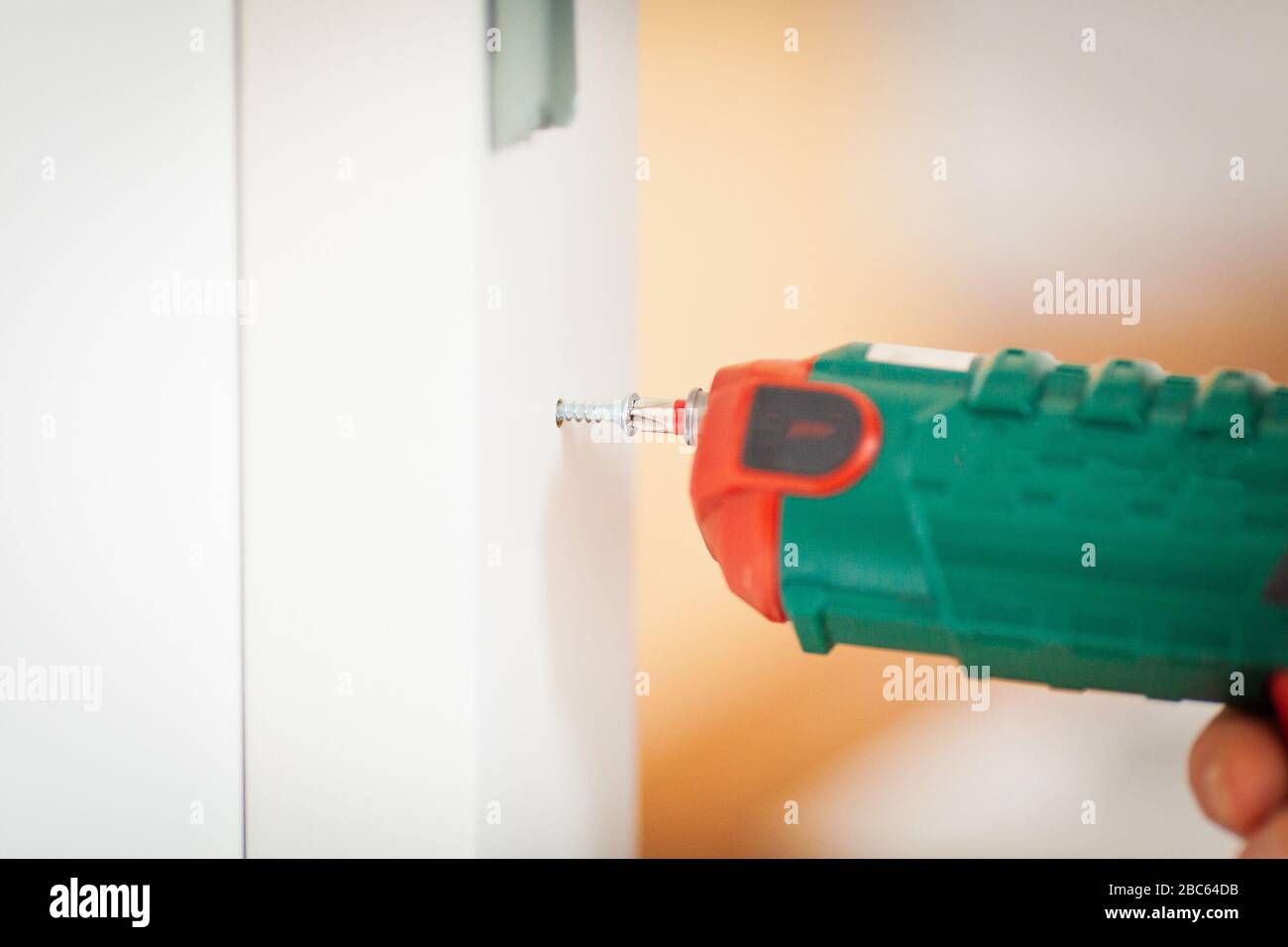 Diy furniture assembly using power drill Stock Photo Alamy