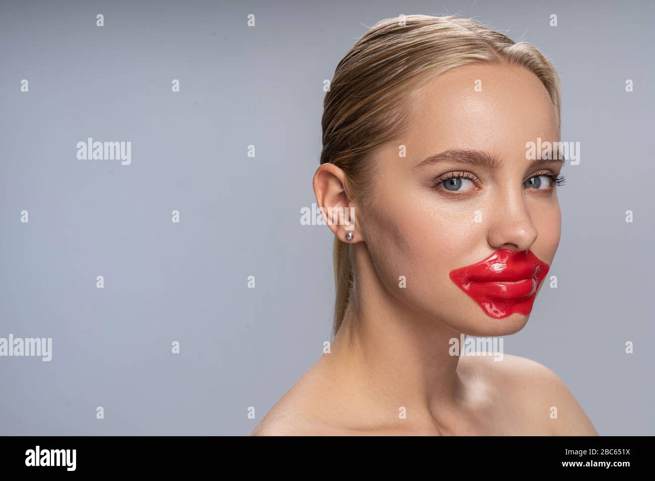 Close up of pleased girl that looking at camera Stock Photo - Alamy