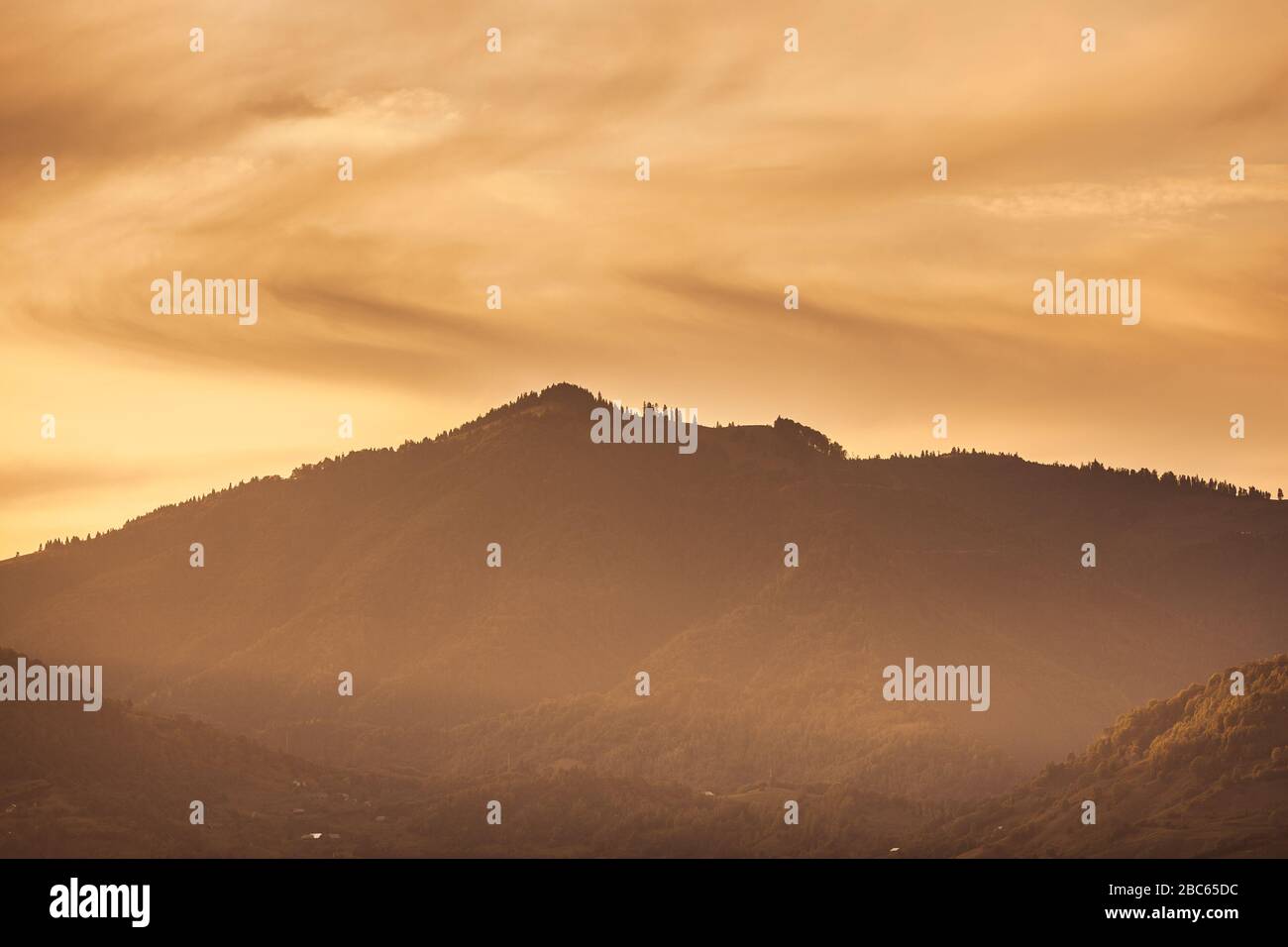 Simple Mountain Silhouette Landscape At Sunset Spruce Trees On The Peak Stock Photo Alamy